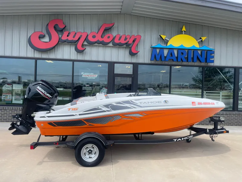 Slide: The Image of 2020 Tahoe T16 boat in front of Sundown Marine store. - 0