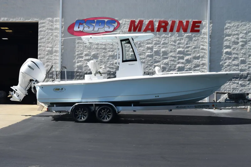 The Image of 2026 Sea Hunt BX 25 FS boat on trailer at GSPS Marine dealership. - 1