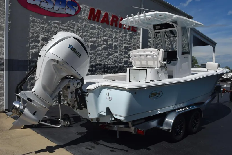 Slide: The Image of 2026 Sea Hunt BX 25 FS boat with Yamaha engine on trailer at dealership. - 4