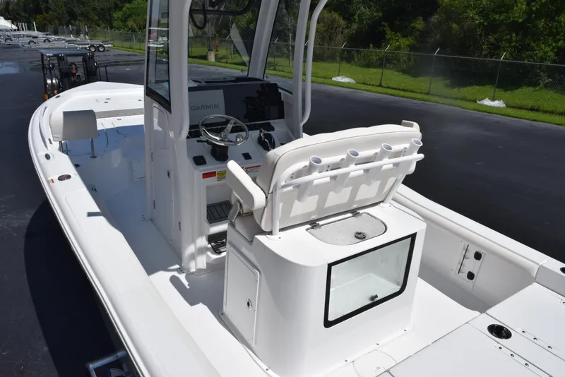 Slide: The Image of 2026 Sea Hunt BX 25 FS boat interior with steering console and seating. - 8