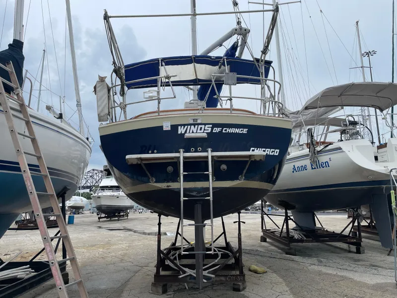 Slide: The Image of 1987 Nonsuch 30 Ultra sailboat "Winds of Change" on dry dock, Chicago marina. - 3