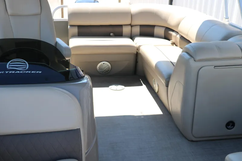 Slide: The Image of 2021 Sun Tracker Party Barge 20 DLX interior with plush seating and modern design. - 12