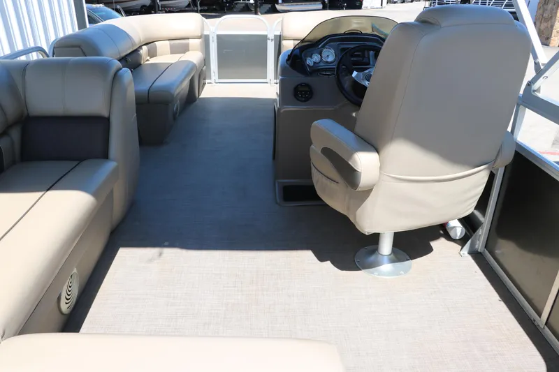 Slide: The Image of Interior of 2021 Sun Tracker Party Barge 20 DLX pontoon boat with beige seating. - 16