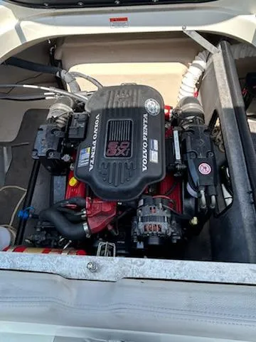 Slide: The Image of Volvo Penta engine in a 2008 Bryant 233 boat, showcasing detailed components. - 17