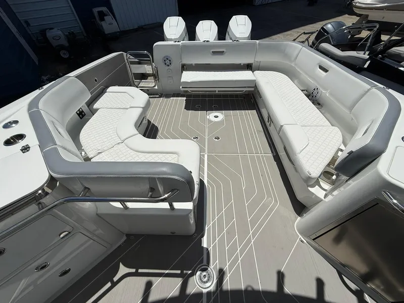 Slide: The Image of 2025 Wellcraft 38 T-Top boat interior with luxurious seating and modern design. - 36