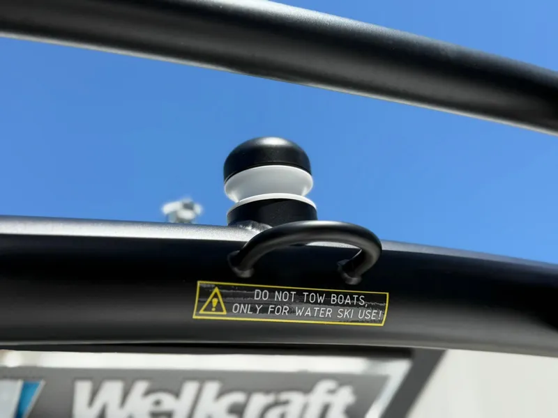 Slide: The Image of 2025 Wellcraft 38 T-Top warning label, "Do not tow boats, only for water ski use." - 40