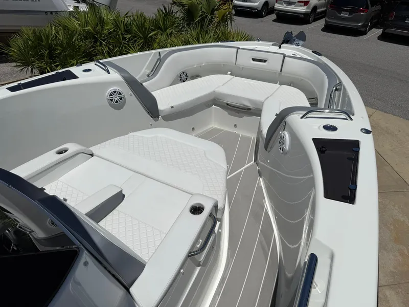 Slide: The Image of 2025 Wellcraft 38 T-Top boat interior with white seating and modern design. - 5