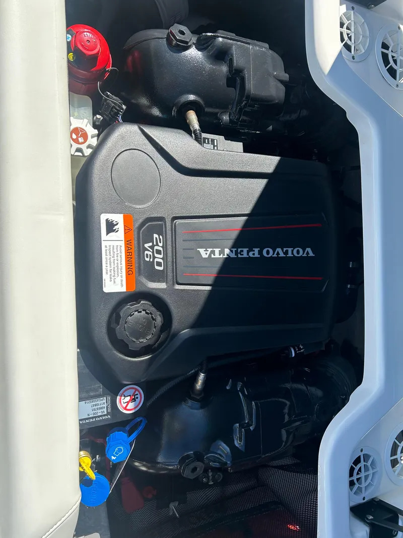 Slide: The Image of Volvo Penta 200 V6 engine in 2021 Regal 1900 ES Bowrider boat. - 19