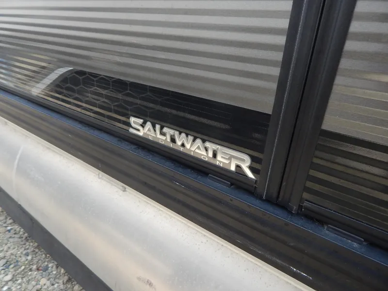 Slide: The Image of 2024 Qwest Splash Pad 822 Saltwater Edition emblem on a textured surface. - 13
