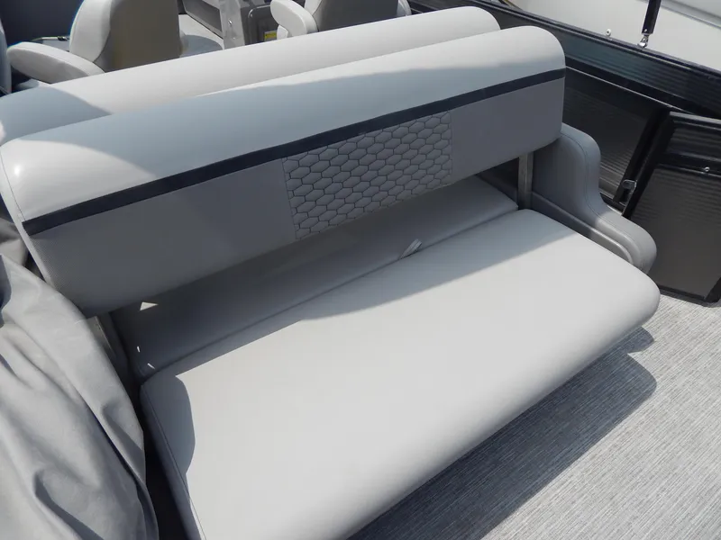 Slide: The Image of 2024 Qwest Splash Pad 822 boat seat with gray upholstery and hexagonal pattern detail. - 17