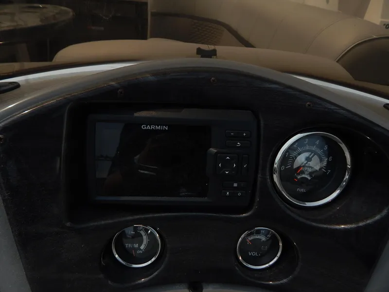 Slide: The Image of Dashboard of 2024 Qwest Splash Pad 822 with Garmin display and gauges. - 29