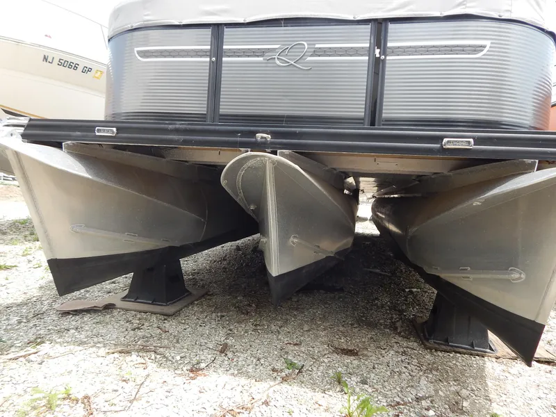 Slide: The Image of 2024 Qwest Splash Pad 822 pontoon boat, underside view showing pontoons and hull design. - 9