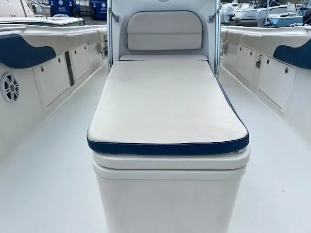 Slide: The Image of 2006 Hydra-Sports Vector 3300 CC boat interior with cushioned seating and storage compartments. - 22
