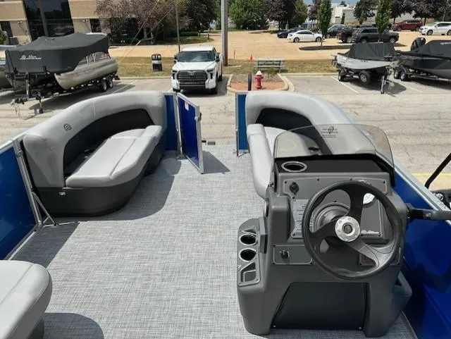 Slide: The Image of 2026 Sun Tracker Party Barge 16 DLX pontoon boat with spacious seating and modern helm. - 4