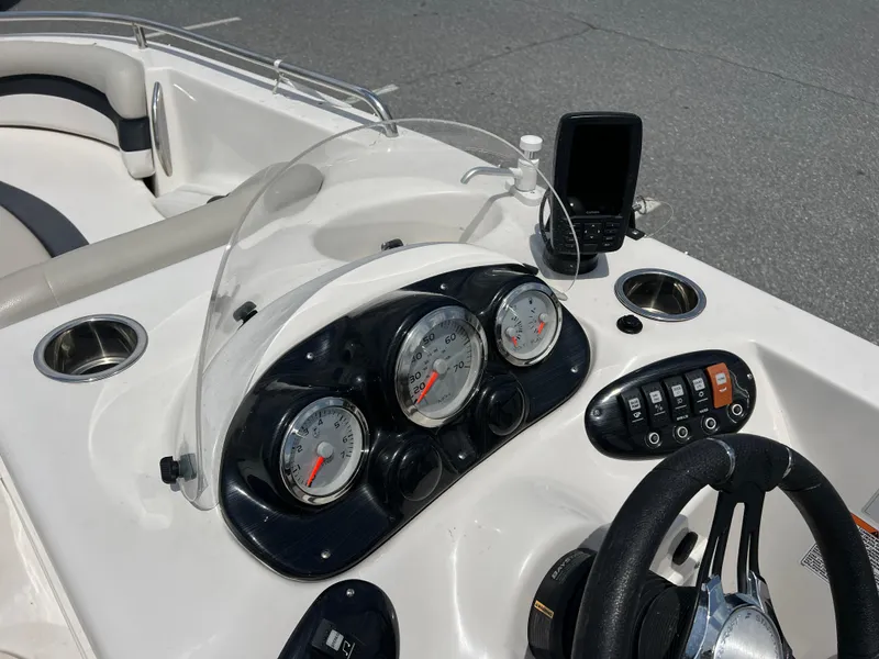 Slide: The Image of 2021 Starcraft Limited 1915 OB boat dashboard with gauges and controls. - 17