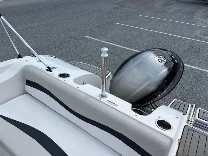Slide: The Image of 2021 Starcraft Limited 1915 OB boat with Yamaha outboard motor in a parking lot. - 23