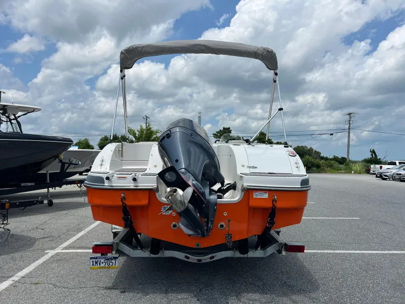 Slide: The Image of 2021 Starcraft Limited 1915 OB boat with outboard motor in parking lot. - 3