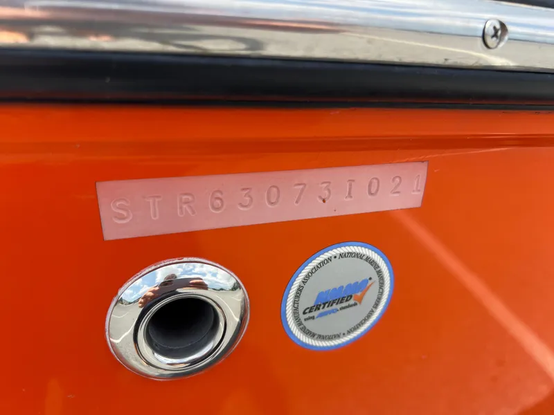 Slide: The Image of 2021 Starcraft Limited 1915 OB boat with certification sticker and serial number. - 9
