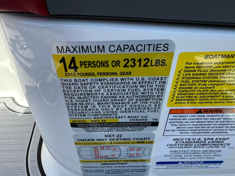 Slide: The Image of 2025 MasterCraft NXT22 capacity label: 14 persons or 2312 lbs, safety compliance details. - 25