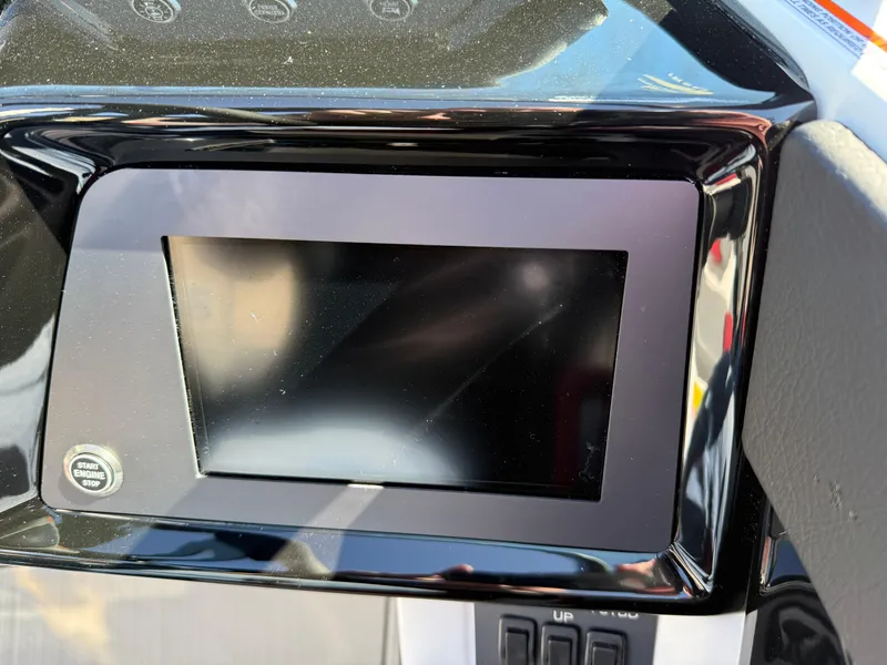 Slide: The Image of Dashboard display of a 2025 MasterCraft NXT22 boat, featuring a start/stop button. - 34