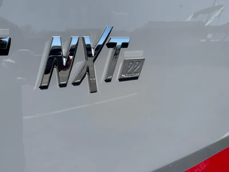 Slide: The Image of 2025 MasterCraft NXT22 logo on a sleek gray surface. - 9