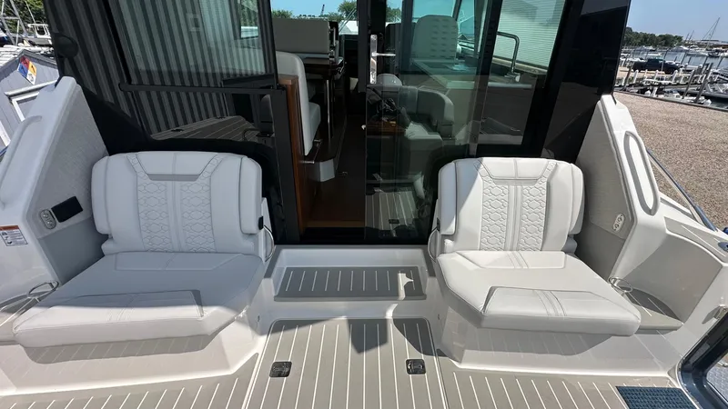 Slide: The Image of 2026 Tiara Yachts 43 LE interior with luxurious seating and modern design. - 15