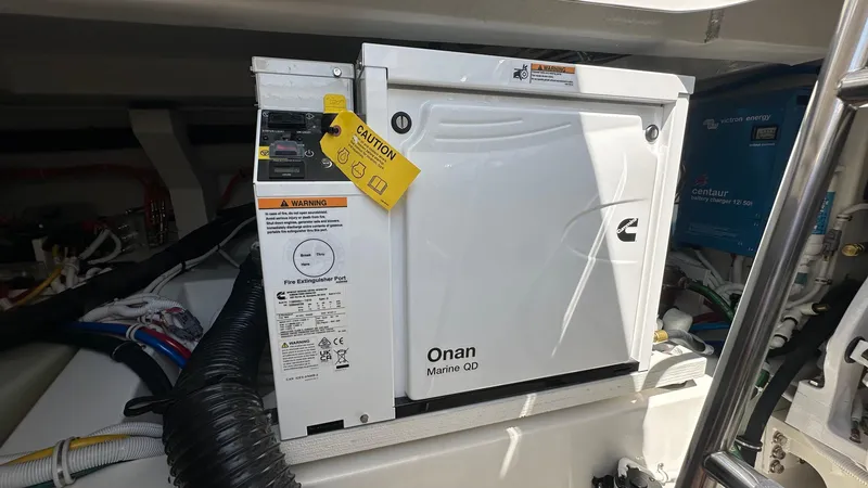 Slide: The Image of Onan Marine QD generator in 2026 Tiara Yachts 43 LE engine room. - 18