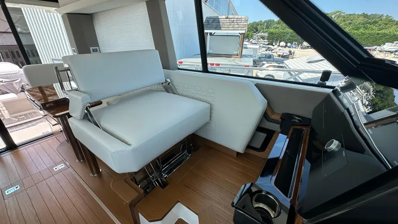 Slide: The Image of Luxurious interior of 2026 Tiara Yachts 43 LE with modern seating and sleek design. - 34