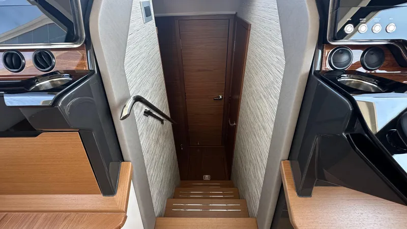 Slide: The Image of Staircase leading to cabin interior of 2026 Tiara Yachts 43 LE. - 38