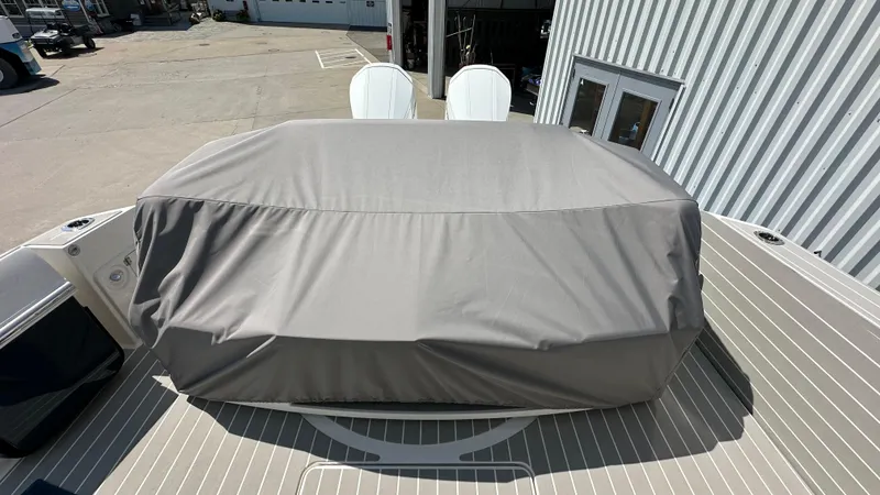Slide: The Image of Covered equipment on 2026 Tiara Yachts 43 LE deck, dockside view. - 4