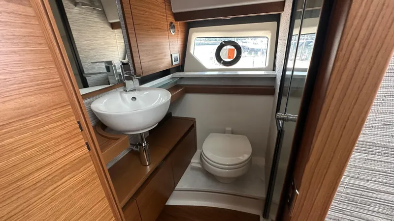 Slide: The Image of Luxurious bathroom in 2026 Tiara Yachts 43 LE, featuring modern sink and toilet. - 45