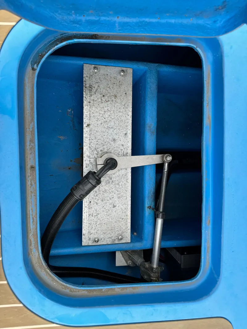 Slide: The Image of Open hatch of 2019 Vision Marine Technologies Fantail 217 boat, showing internal components. - 18