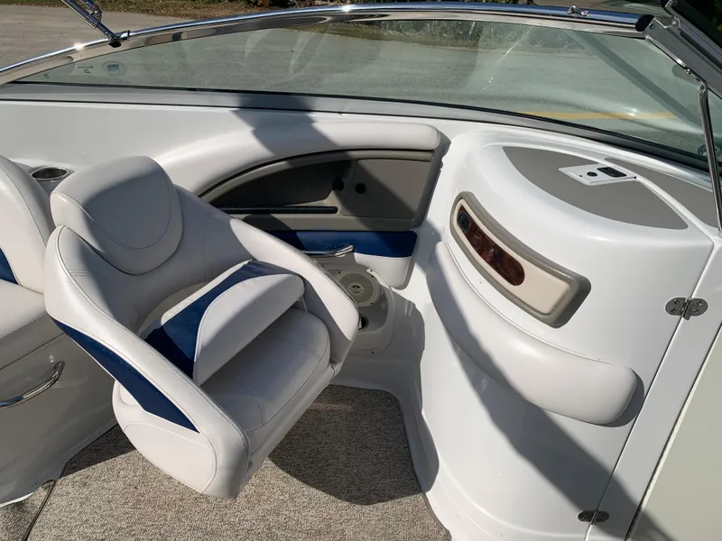 Slide: The Image of 2012 Crownline Eclipse E4 boat interior with white and blue seating. - 19