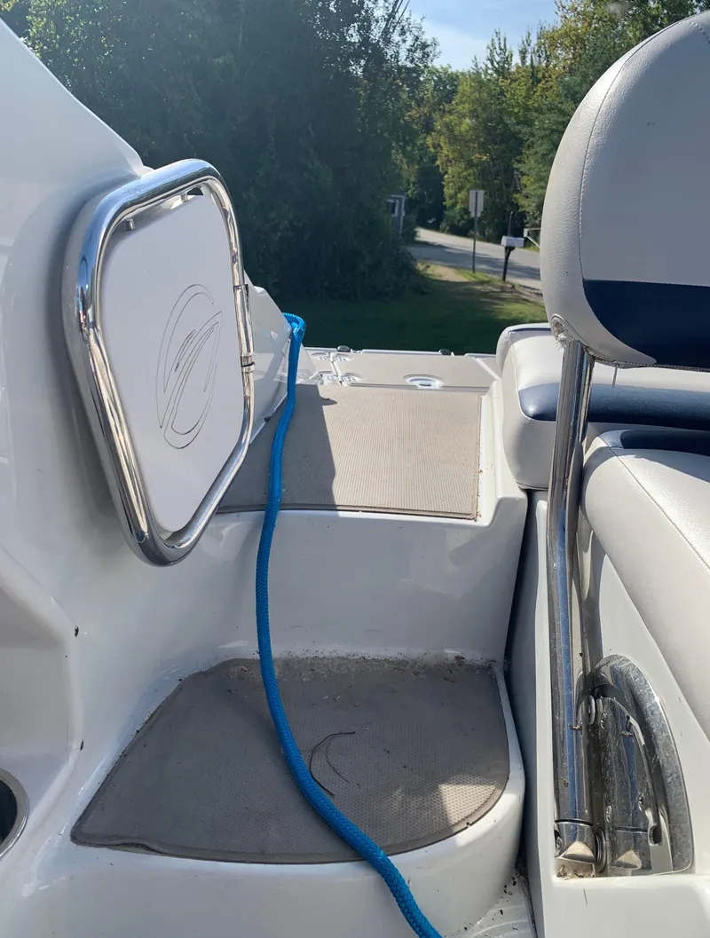 Slide: The Image of 2012 Crownline Eclipse E4 boat interior with blue rope and seating. - 8