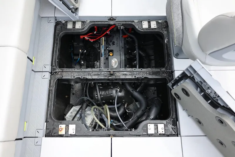 Slide: The Image of 2022 Sea-Doo Switch Cruise 21 engine compartment with visible components and wiring. - 28