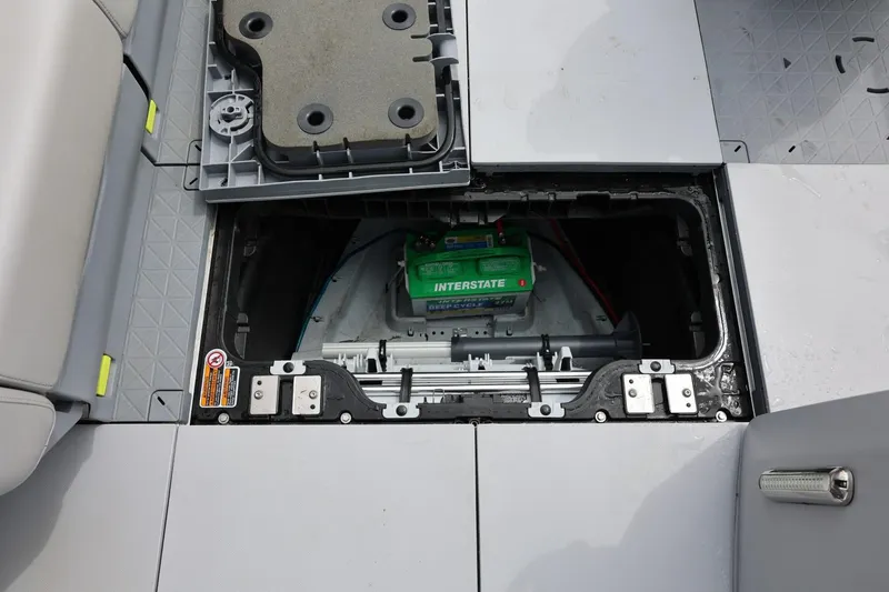 Slide: The Image of 2022 Sea-Doo Switch Cruise 21 battery compartment with Interstate battery visible. - 31