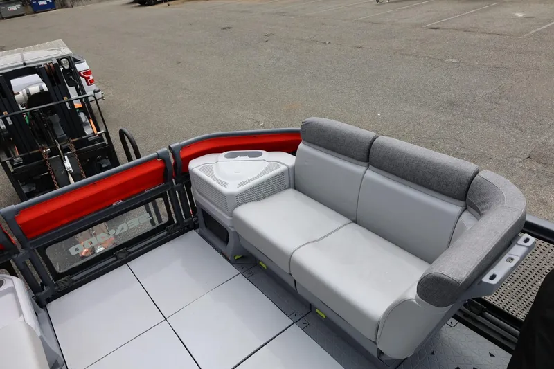 Slide: The Image of 2022 Sea-Doo Switch Cruise 21 interior with gray seating and red accents. - 34