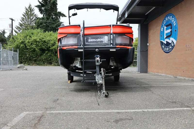 Slide: The Image of 2022 Sea-Doo Switch Cruise 21 on trailer at Bjornson Marine parking lot. - 6