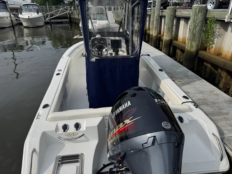 Slide: The Image of 2014 Sea Hunt Ultra 196 boat with Yamaha engine on trailer. - 2