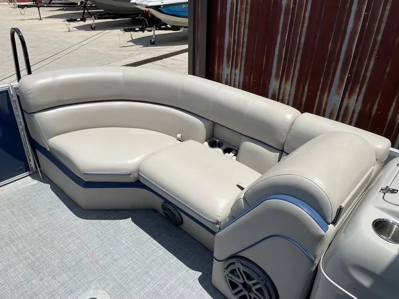 Slide: The Image of Luxurious seating on a 2017 South Bay 500 pontoon boat, featuring plush upholstery. - 12
