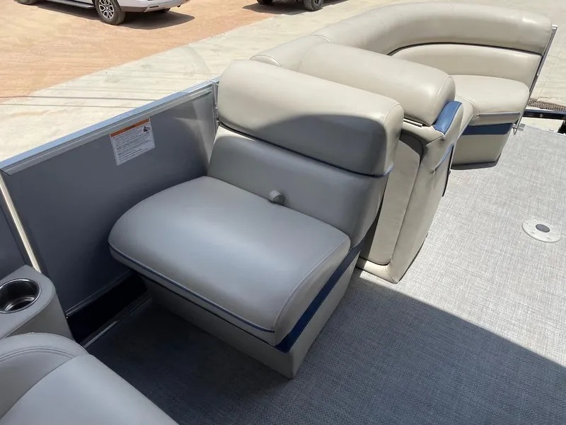 Slide: The Image of 2017 South Bay 500 boat interior with beige seating and carpeted floor. - 7