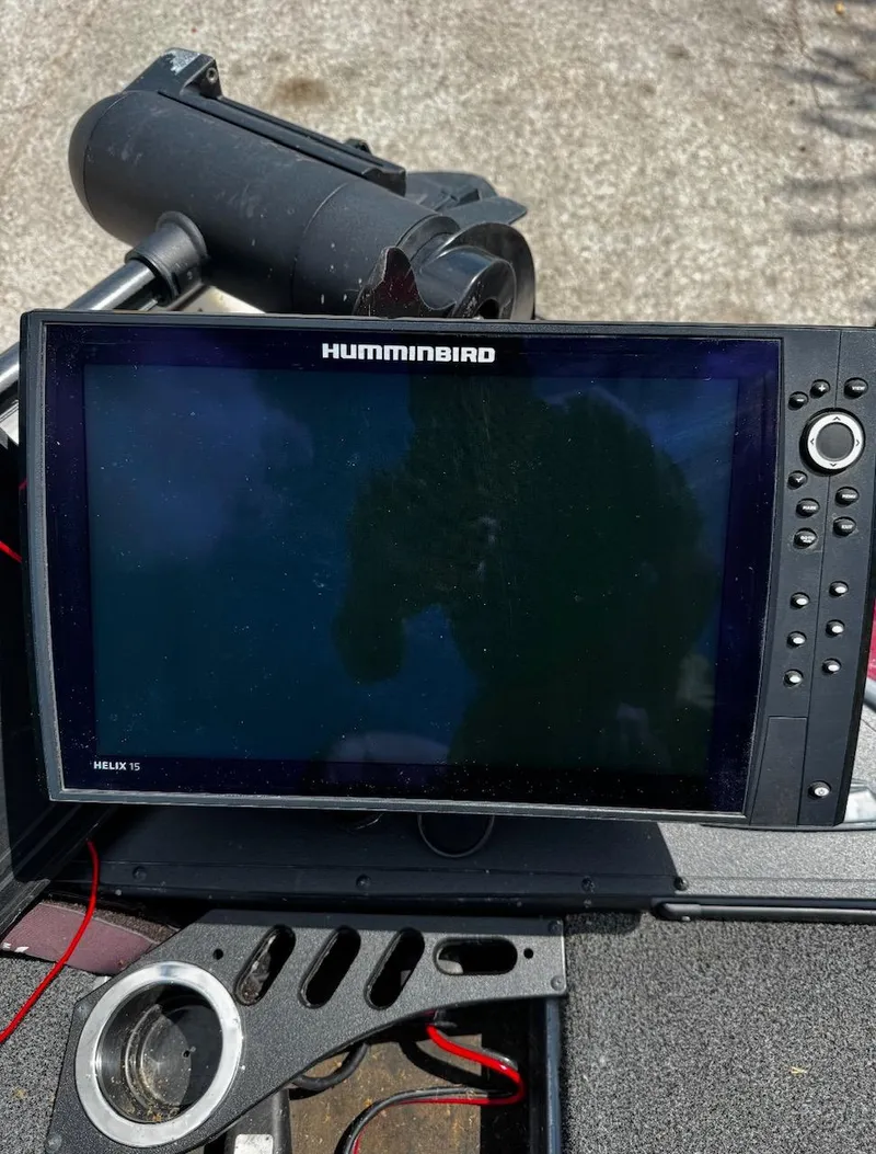 Slide: The Image of Humminbird Helix 15 fish finder on 2021 Tracker Nitro Z21 SC boat dashboard. - 5