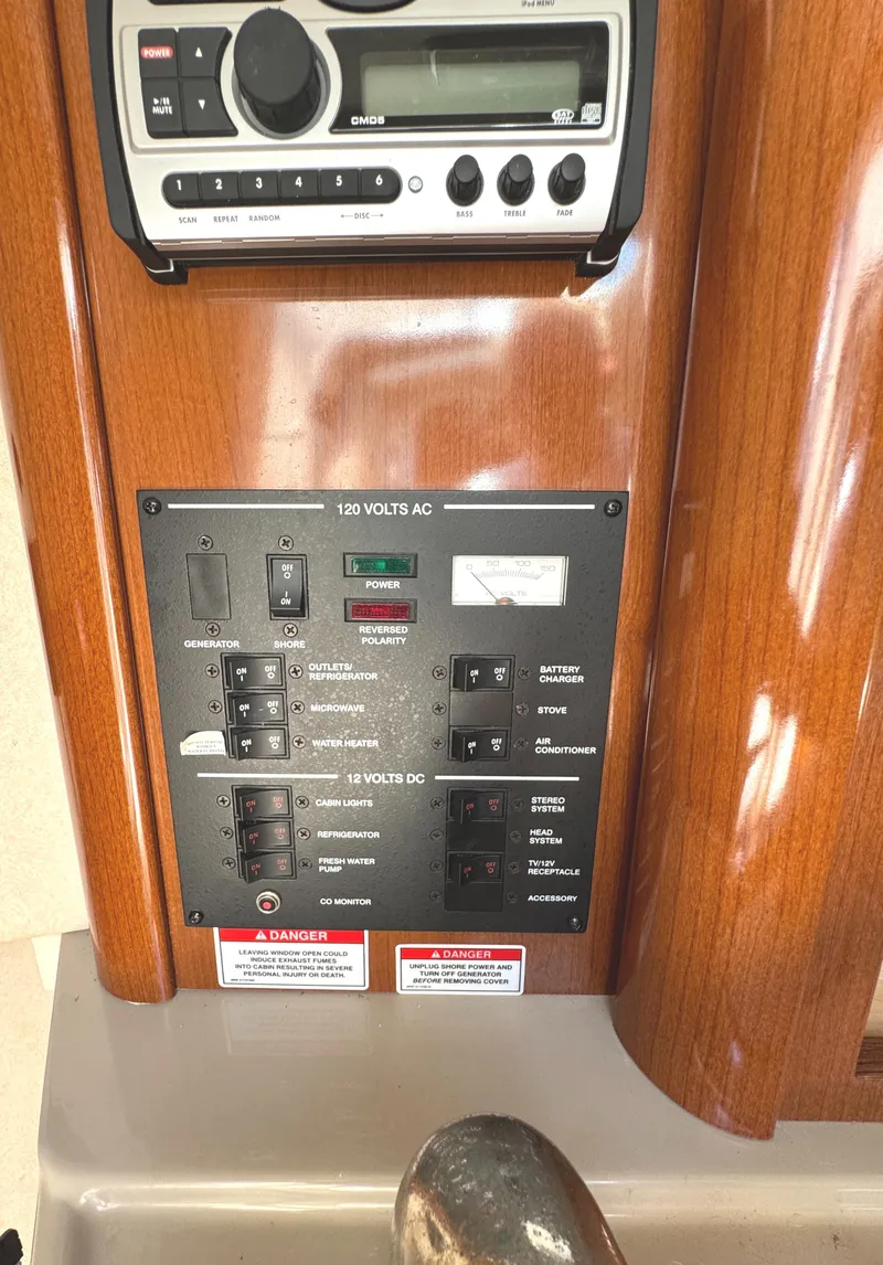 Slide: The Image of Control panel of a 2008 Sea Ray 240 Sundancer boat with stereo system. - 20