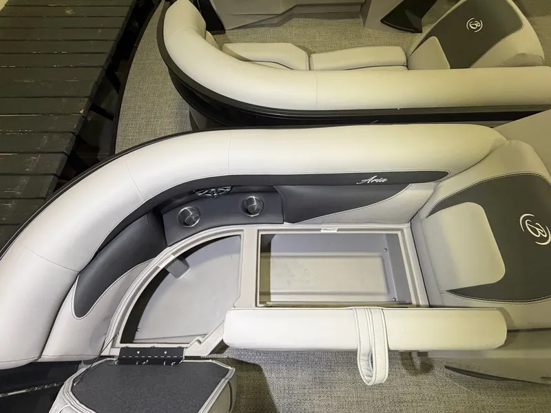 Slide: The Image of Interior view of a 2026 Barletta Aria 22 QC with sleek, cushioned seating and storage space. - 2