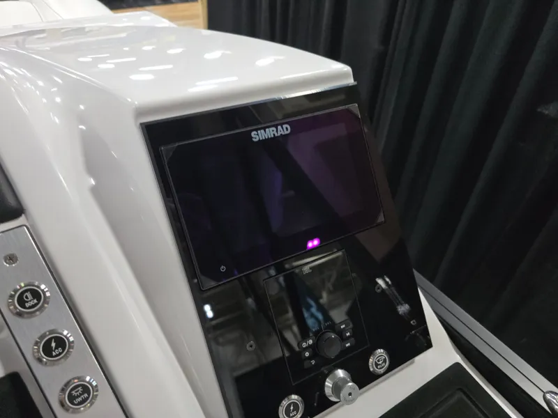 Slide: The Image of Barletta Corsa 23 U 2026 boat console with Simrad display. - 25