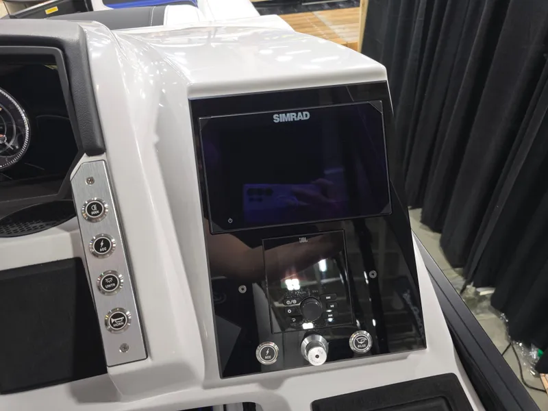 Slide: The Image of Dashboard of 2026 Barletta Corsa 23 U with Simrad display. - 27