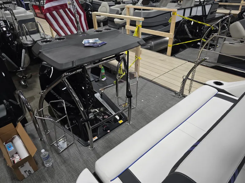 Slide: The Image of Barletta Corsa 23 U 2026 pontoon boat with modern features and American flag. - 37