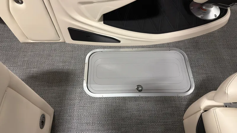 Slide: The Image of Interior of 2026 Barletta Lusso 25 U with carpet and storage hatch. - 14