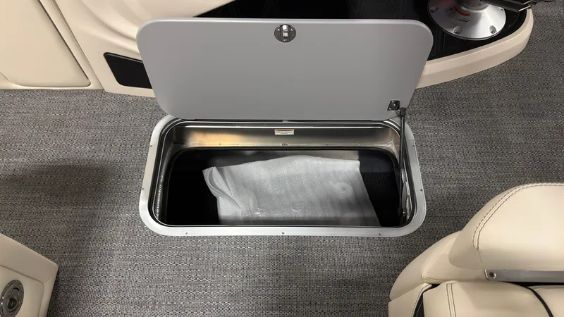 Slide: The Image of Barletta Lusso 25 U 2026 floor storage compartment open. - 16