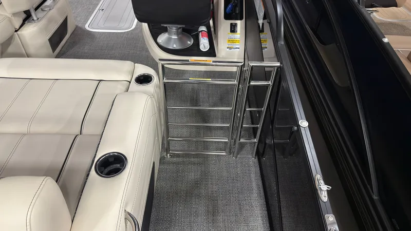 Slide: The Image of Interior of 2026 Barletta Lusso 25 U with seating and safety railing. - 33